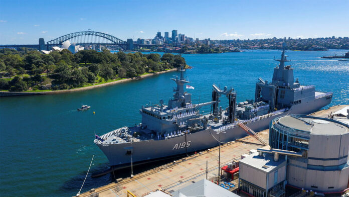 An aerial view of HMAS Supply's commissioning ceremony at Fleet Base East in Sydney, New South Wales.
