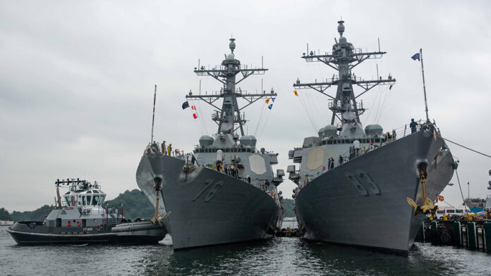 The Arleigh Burke-class guided-missile destroyer USS Higgins (DDG 76) arrives at Commander, Fleet Activities Yokosuka (CFAY), Japan Aug. 16 as one of the newest additions to Commander, Task Force (CTF) 71/Destroyer Squadron (DESRON) 15. Higgins is assigned to (U.S. Navy)